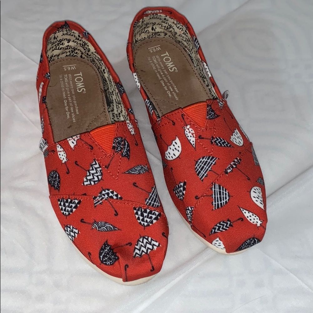 TOMS Size 6.5 “Singing in the Rain” Slip Ons